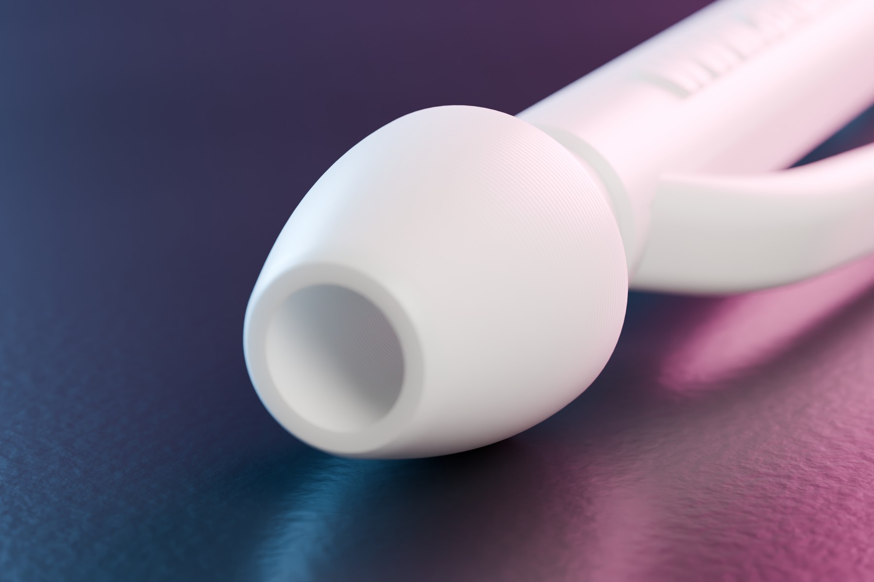 Close-up of the rounded white nose bulb at the tip of the straw